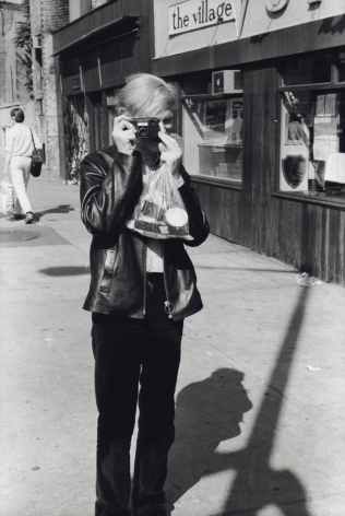 Fred W. McDarrah- Andy Warhol Taking a Photo in Front of Village Voice Office